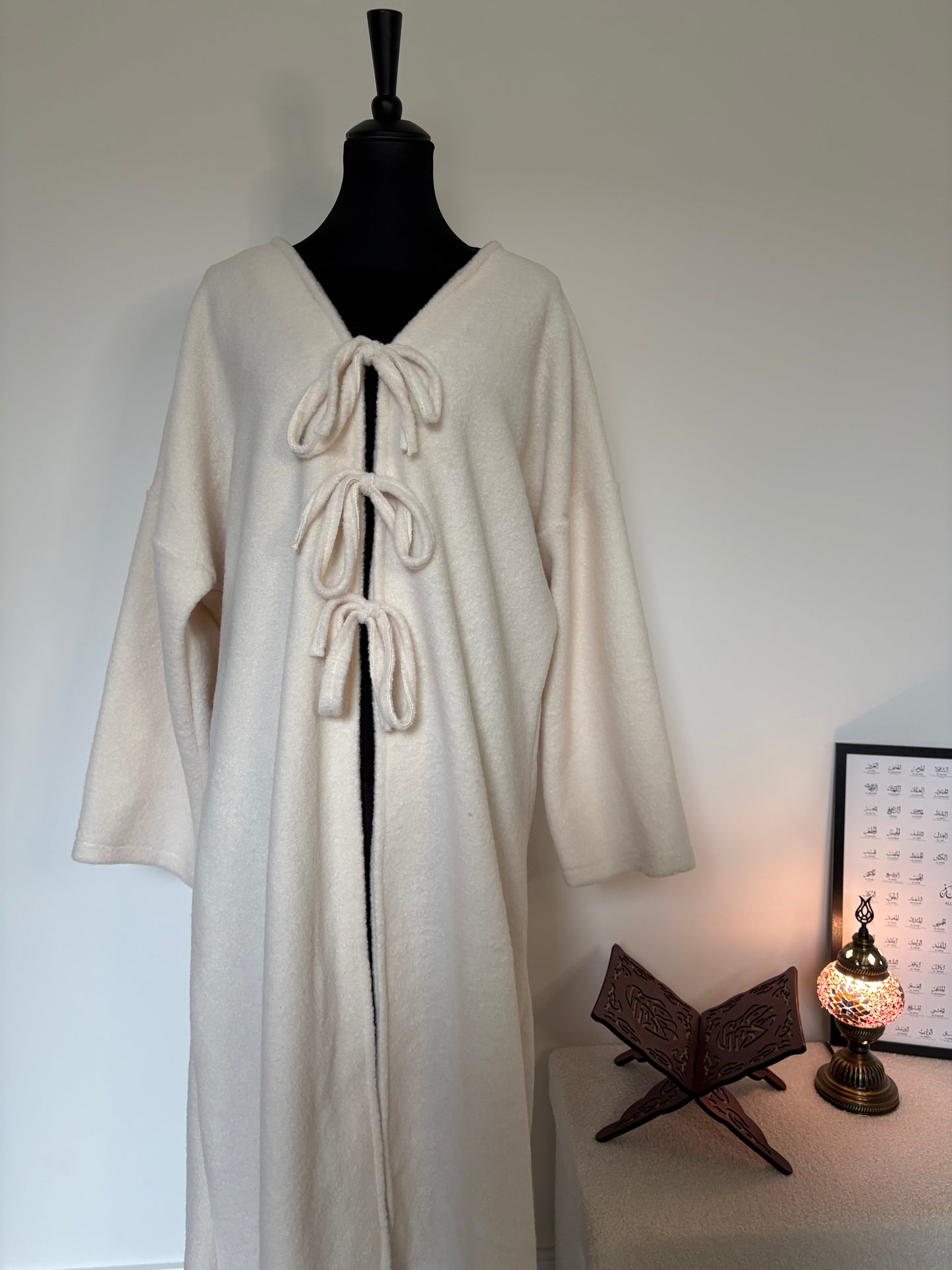 Mantel mit Schleifen